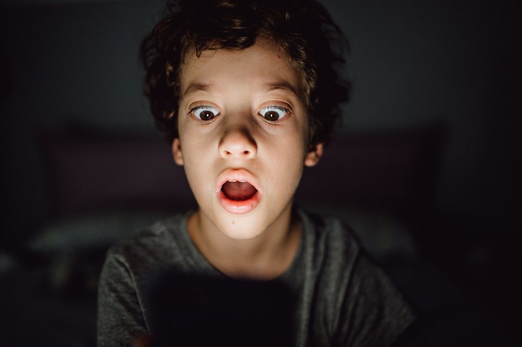 Scared Kid watching adult online content